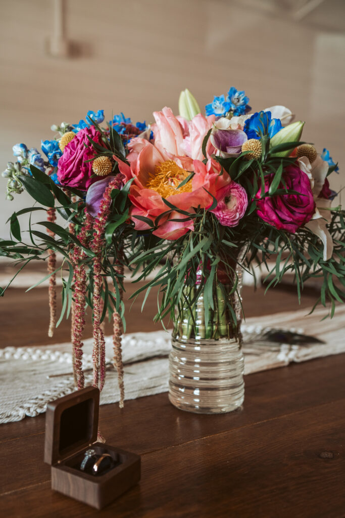 Bridal bouquet and wedding rings at BASH in Carmel, IN