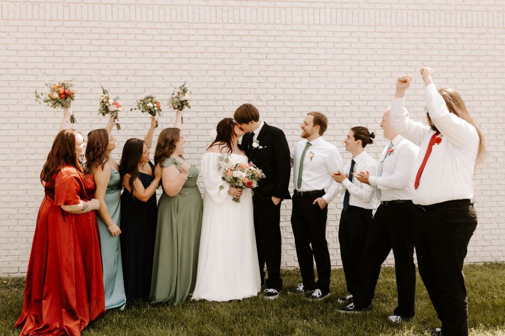 Wedding party photos in front of BASH