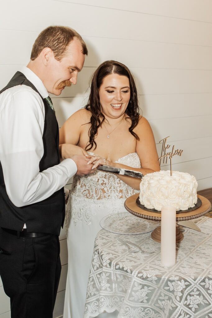 Bride and groom cake cutting