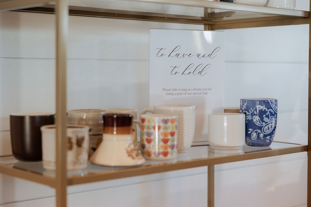 Wedding favor shelf with mugs at BASH