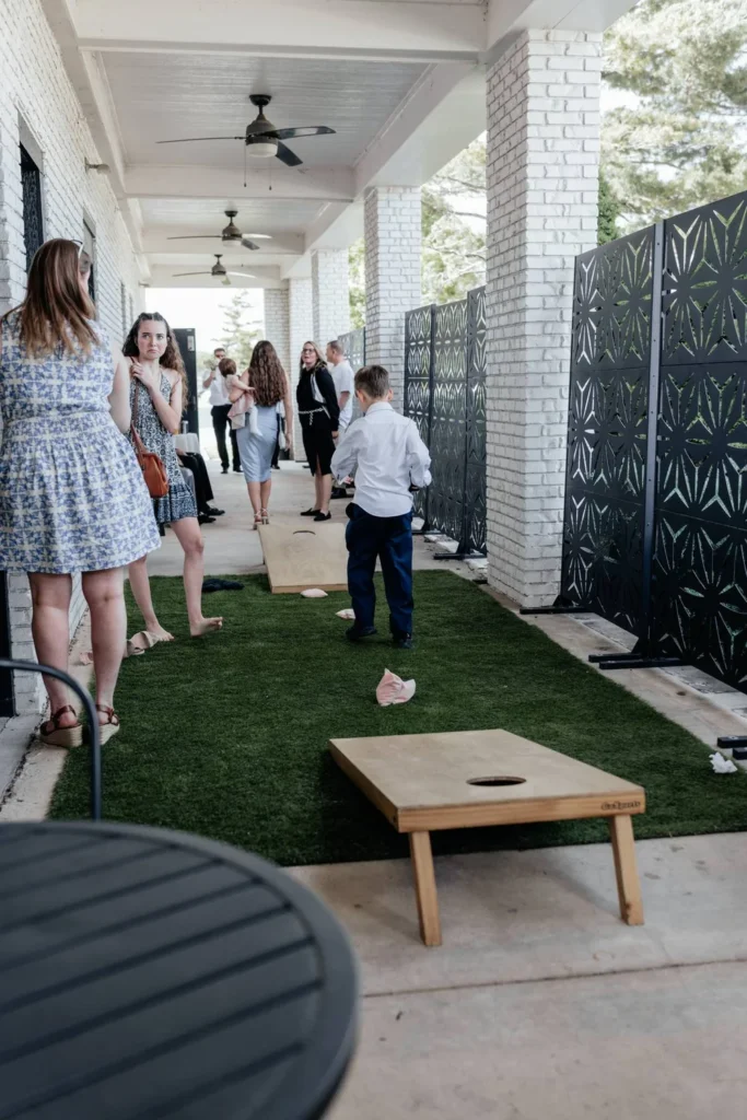 Guests at a wedding at BASH in Carmel, IN playing cornhole