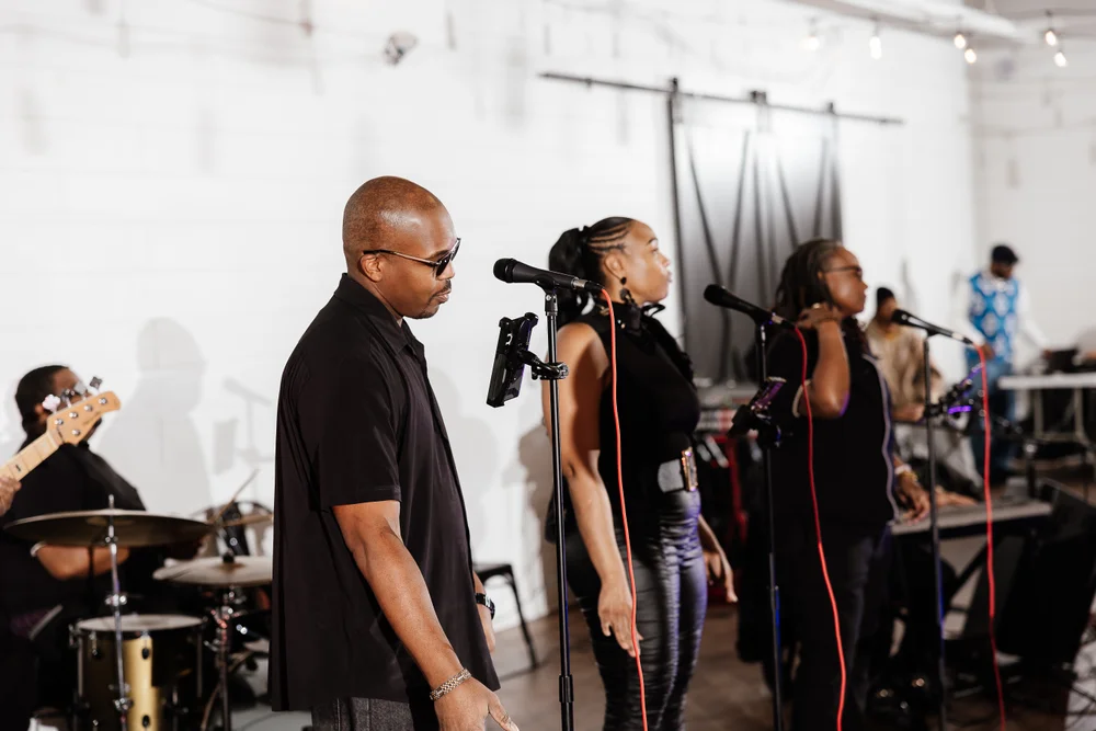 Live music being performed at an office holiday party