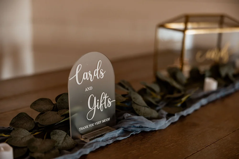 Gift table at BASH venue set up for guests to place gifts during the celebration.