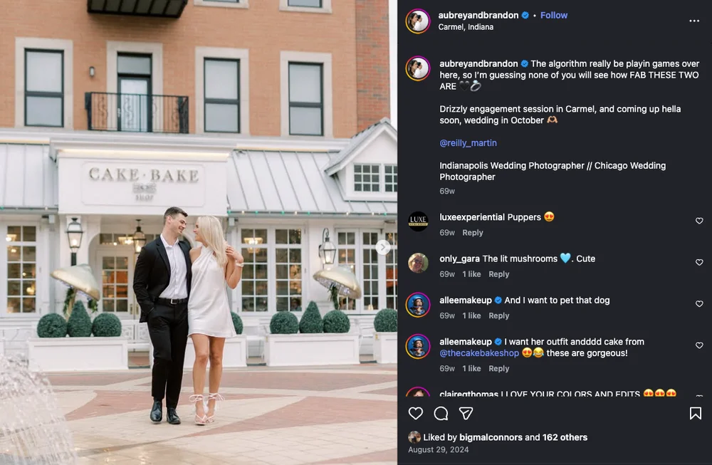 Engaged couple posing outside Cake Bake in Carmel, Indiana during engagement photos